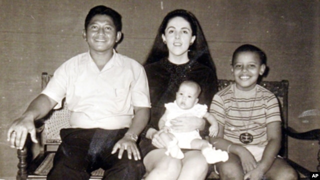 The author - Maya Soetoro-Ng - as a baby and  her brother, Barack Obama, with their mother, Ann Dunham, and her father, Lolo Soetoro, in an undated family snapshot.
