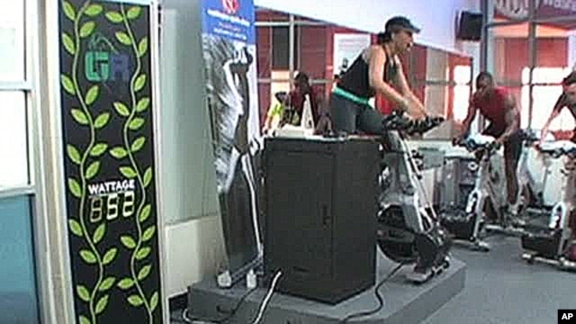 Health club members can see how much electricity they generate while riding their exercise bikes.