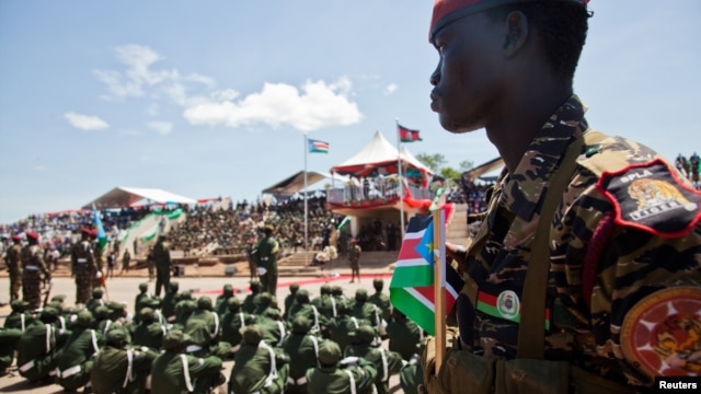 A Sudan People's Liberation Army (SPLA) soldier watches on during a parade celebrating their 29th anniversary in South Sudan's capital Juba, May 16, 2012. 