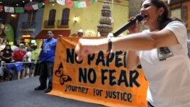 Georgia Latino Alliance for Human Rights member Adelina Nicholls, of Mexico, joins members of a cross-country group of undocumented immigrants participating in a "No Papers No Fear" event at Fiesta Mall in Atlanta, August 25, 2012.