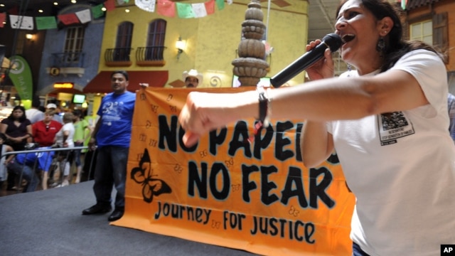 Georgia Latino Alliance for Human Rights member Adelina Nicholls, of Mexico, joins members of a cross-country group of undocumented immigrants participating in a "No Papers No Fear" event at Fiesta Mall in Atlanta, August 25, 2012.
