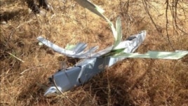Turkey's state-run Anatolia News Agency released this image of what Turkey says is an unmanned aircraft shot down by Turkish forces Oct. 16, 2015, near the border with Syria.