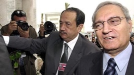 Syrian Vice President Farouk al-Sharaa, right (file photo)