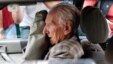 Alleged Hungarian war criminal Laszlo Csatary sits in a car as he leaves the Budapest prosecutor's office, (File photo).