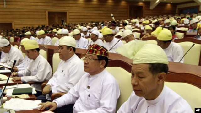 Lower House lawmakers attend a regular session of parliament in Naypyitaw, Burma, April 23, 2012.