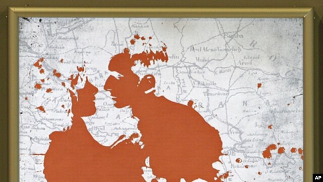 A poster of Angelina Jolie's 'In the Land of Blood and Honey' film in Belgrade, Feb. 24, 2012.