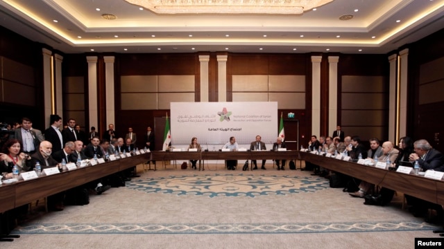 Syrian Opposition Coalition members and Syrian National Coalition members attend a meeting in Istanbul, March 18, 2013. 