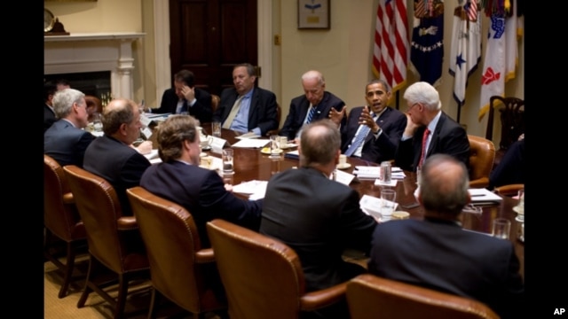 President Obama and Vice President Joe Biden meet with President Bill Clinton and business leaders in the White House, 14 July 2010