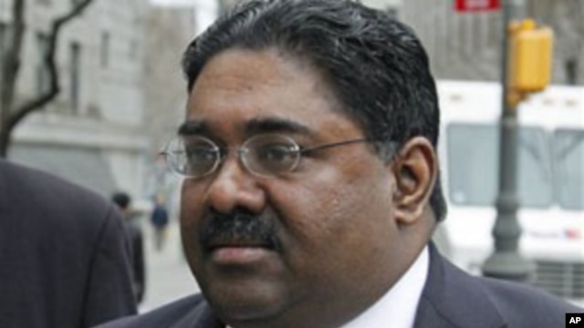 Galleon Group founder Raj Rajaratnam, right, arrives at federal court with his attorney,  in New York (File Photo - April 4, 2011).