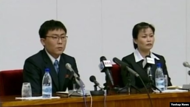 탈북해서 한국에 정착했다가 다시 북한으로 재입북한 김광혁(왼쪽), 고정남 부부. 8일 북한 관영 조선중앙TV가 이들의 기자회견 장면을 보도했다.