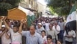 Residents carry the coffin of Muhammad Mousa, whom protesters say was killed by forces loyal to Syria