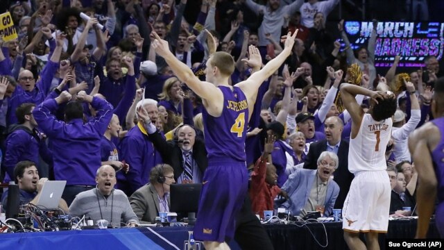 Northern Iowa guard Paul Jesperson gestures to fans after hitting the game-winning shot against Texas in a first-round men's college basketball game in the NCAA Tournament, Friday, March 18, 2016, in Oklahoma City. 