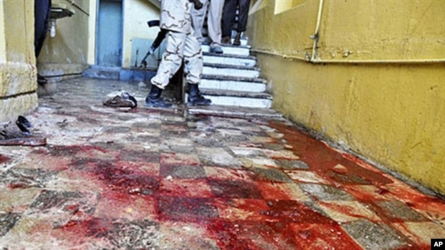 Stains of blood cover a hallway inside the Hotel Muna in Mogadishu, 24 Aug 2010
