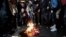 Following President-elect Donald Trump's election victory, protesters burn a U.S. flag outside Trump Tower in New York November 9, 2016.