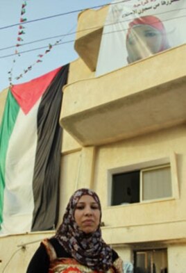 Samud Kraja outside her family home in the village of Saffa near Ramallah.