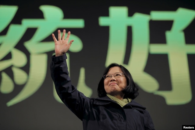 ILE - Tsai Ing-wen waves to her supporters after her election victory at party headquarters in Taipei, Taiwan, Jan. 16, 2016.