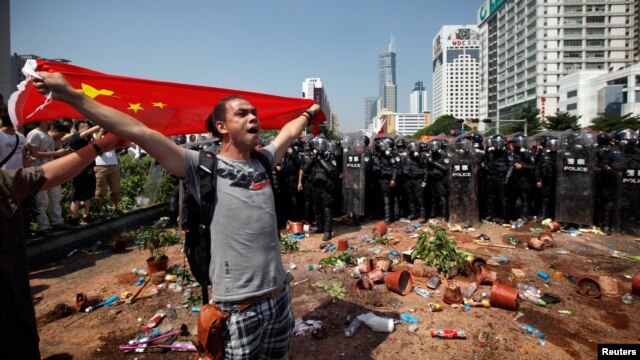 Protests against Japan's decision to purchase the disputed islands take place in Shenzhen, China, September 16, 2012.