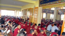 Tibetans gathered at Tsulagkhang Temple in Dharamsala to pray for late Tsewang Dorjee who died after his self-immolation