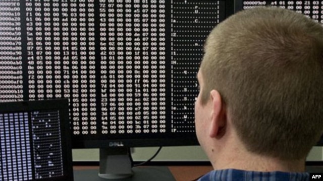 A security analyst looks at code at the U.S. government's cyber defense lab in Idaho Falls, Idaho