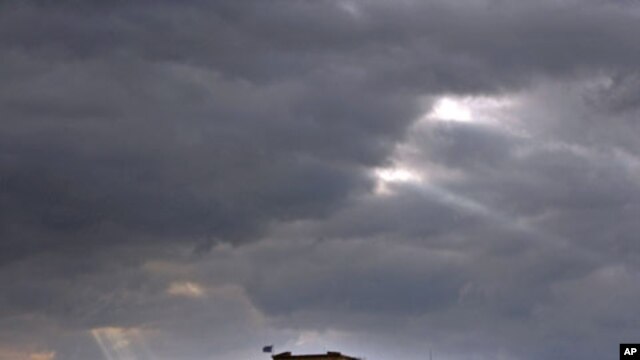 The Athens Acropolis at sunset on a cloudy day, November 15, 2011.