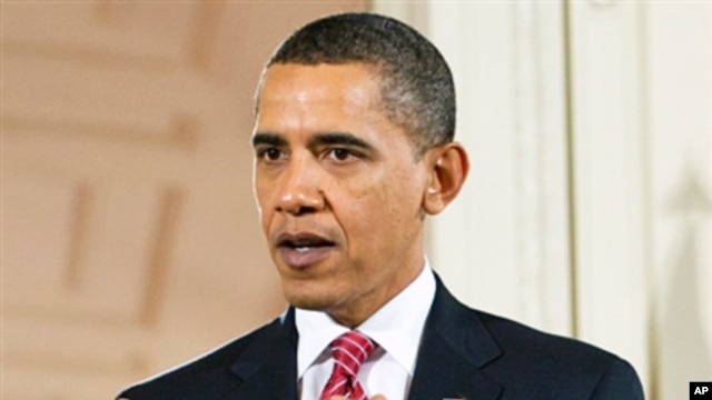 President Barack Obama speaks during a joint press conference with Indian PM Manmohan Singh (not pictured) at the White House, 24 Nov 2009