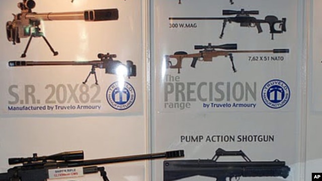 Assorted military guns are on display at India's defense show in New Delhi, 15 Feb 2010