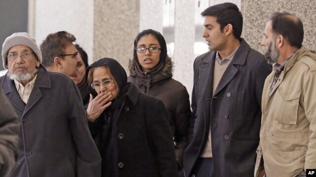 Family members and supporters of Chicago businessman Tahawwur Rana leave after Rana's sentencing in federal court Jan. 17, 2013 in Chicago. (AP/ M. Spencer Green)