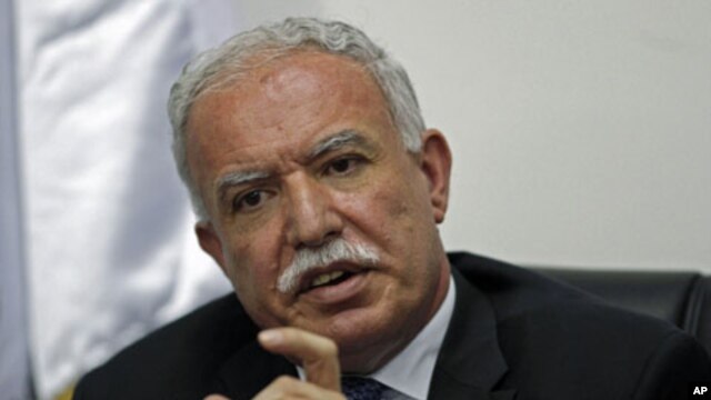 Palestinian Foreign Minister Riad Al-Maliki gestures as he speaks during a news conference in the West Bank city of Ramallah, September 15, 2011.