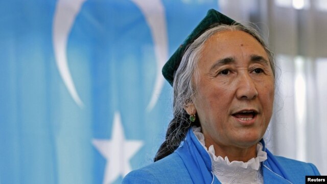 Uighur leader Rebiya Kadeer delivers a speech in front of a East Turkestan flag at the fourth General Assembly of the World Uighur Congress in Tokyo, May 14, 2012.