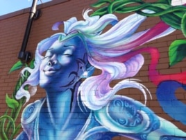 Detail from mural by Aniekan Udofia, Washington, D.C., July, 2014. (J. Taboh/VOA)