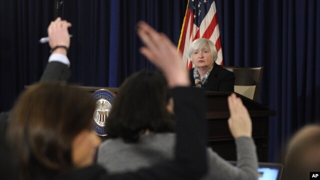 Federal Reserve Chair Janet Yellen participates in her first news conference at the Federal Reserve in Washington, March 19, 2014.