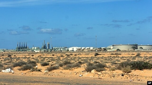 The oil refinery at Ras Lanouf last month when was still in rebel hands, March 5, 2011