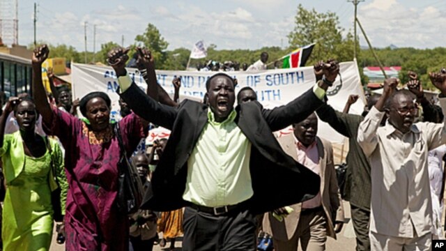 Hundreds of southern Sudanese take part in a demonstration against northern Sudan's military incursion into the border town of Abyei in the southern capital of Juba, May 23, 2011.