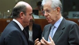 Španski i italijanski ministri finansija, Luis de Gvindos Hurado i Mario Monti