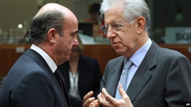 Španski i italijanski ministri finansija, Luis de Gvindos Hurado i Mario Monti
