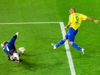 Brazil's Ronaldo beats Germany's goalie Oliver Kahn to score during the second half of the 2002 World Cup final.