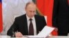 Putin Signs Law Officially Annexing Crimea   
