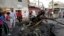 Basra'da bombalı saldırıda tahrip olan araçlar  