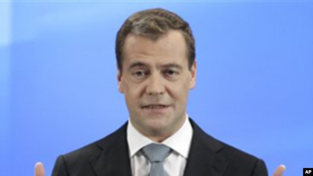 Russian President Dmitry Medvedev speaks during a news conference at a business school in Skolkovo, outside Moscow, Russia,  May 18, 2011