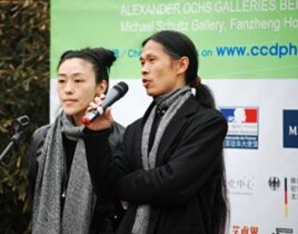Photographer and gallery owner Rong Rong speaks at opening of Caochangdi PhotoSpring