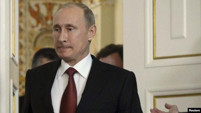 Russian President Vladimir Putin after a meeting with Iraqi Prime Minister Nouri al-Maliki in the Novo-Ogaryovo residence outside Moscow, October 10, 2012. 