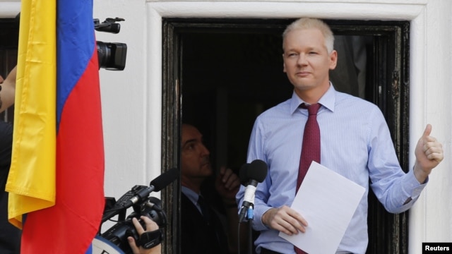 Wikileaks founder Julian Assange appears to speak from the balcony of Ecuador's embassy, where he is taking refuge in London, August 19, 2012.