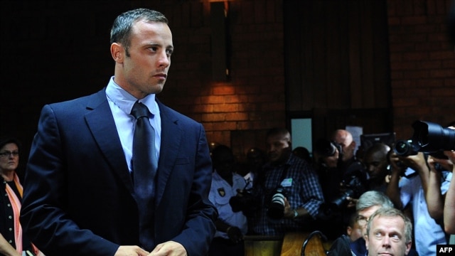 South African Olympic sprinter Oscar Pistorius appears at the Magistrate Court in Pretoria on February 22, 2013. 