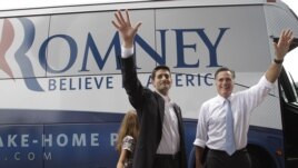 Republican presidential candidate, former Massachusetts Gov. Mitt Romney, right, and vice presidential candidate Wisconsin Rep. Paul Ryan are joined by Ryan's daughter Liza as they wave to the crowd, Aug. 11, 2012, in Norfolk, Va. 