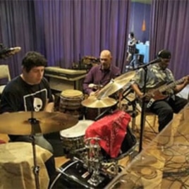 Students have recorded CDs with well-known bands like Taj Mahal