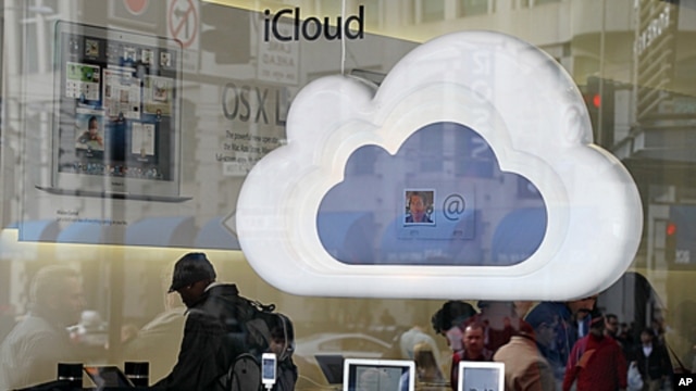 Apple products are displayed in the window of an Apple Store in San Francisco, California,  January 24, 2012.