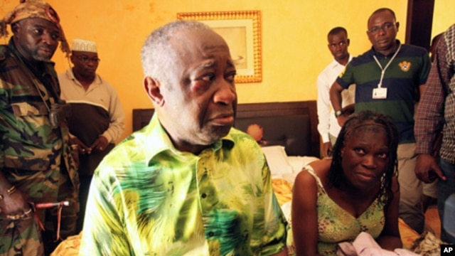 Former Ivorian President Laurent Gbagbo and his wife Simone, in the custody of  forces loyal to Alassane Ouattara at the Golf Hotel in Abidjan, Ivory Coast, April 11, 2011