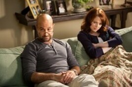 Stanley Tucci as Olive's father "Dill" and Emma Stone as "Olive Penderghast" in Screen Gems' EASY A.