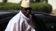 FILE - Gambia's President Yahya Jammeh arrives for a summit to address a seminar on security during an event marking the centenary of the unification of Nigeria's north and south in Abuja, Nigeria, Feb. 27, 2014.