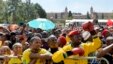 FILE - People attend 20-year Democracy Anniversary celebrations near to the government's Union Building, background, in Pretoria, South Africa, Sunday, April 27, 2014.